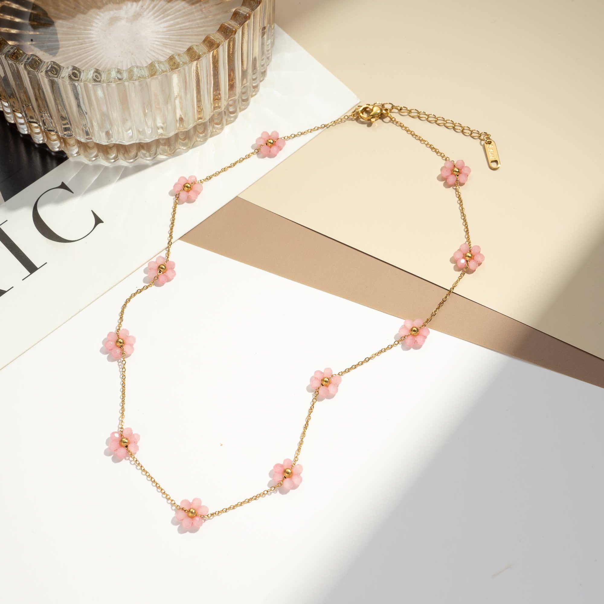 Collier acier inoxydable doré petites fleurs