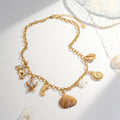 Collier a breloques coquillage Doré "Trésor Océanique"
