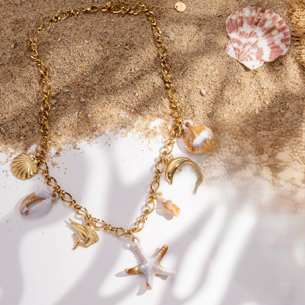 Collier acier inoxydable doré mer étoile dauphin coquillage