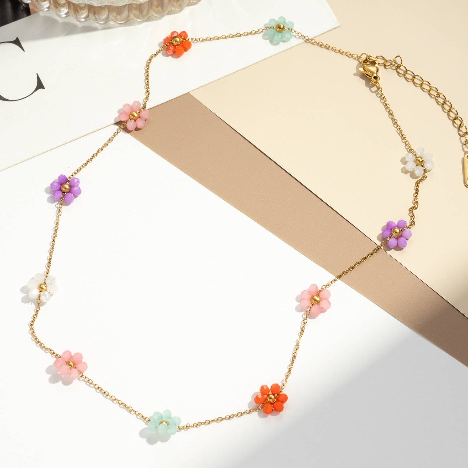 Collier acier inoxydable doré petites fleurs