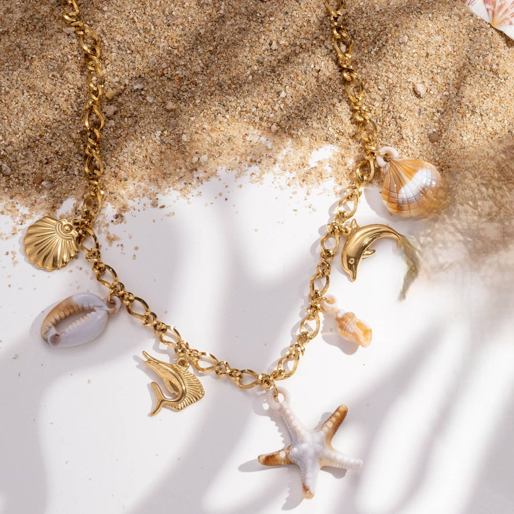 Collier acier inoxydable doré mer étoile dauphin coquillage
