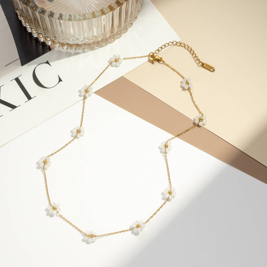Collier acier inoxydable doré petites fleurs
